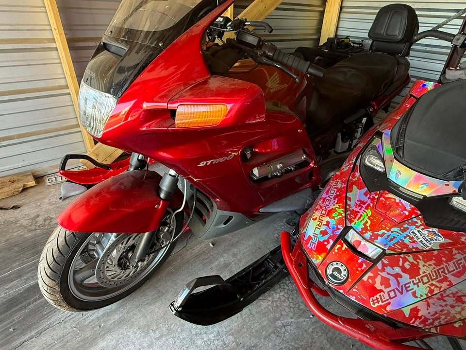 $3000.00. Cherry red and cherry ST1100 Honda. Matching hard saddle boxes for rear.  Runs great needs a battery. Clear tittle