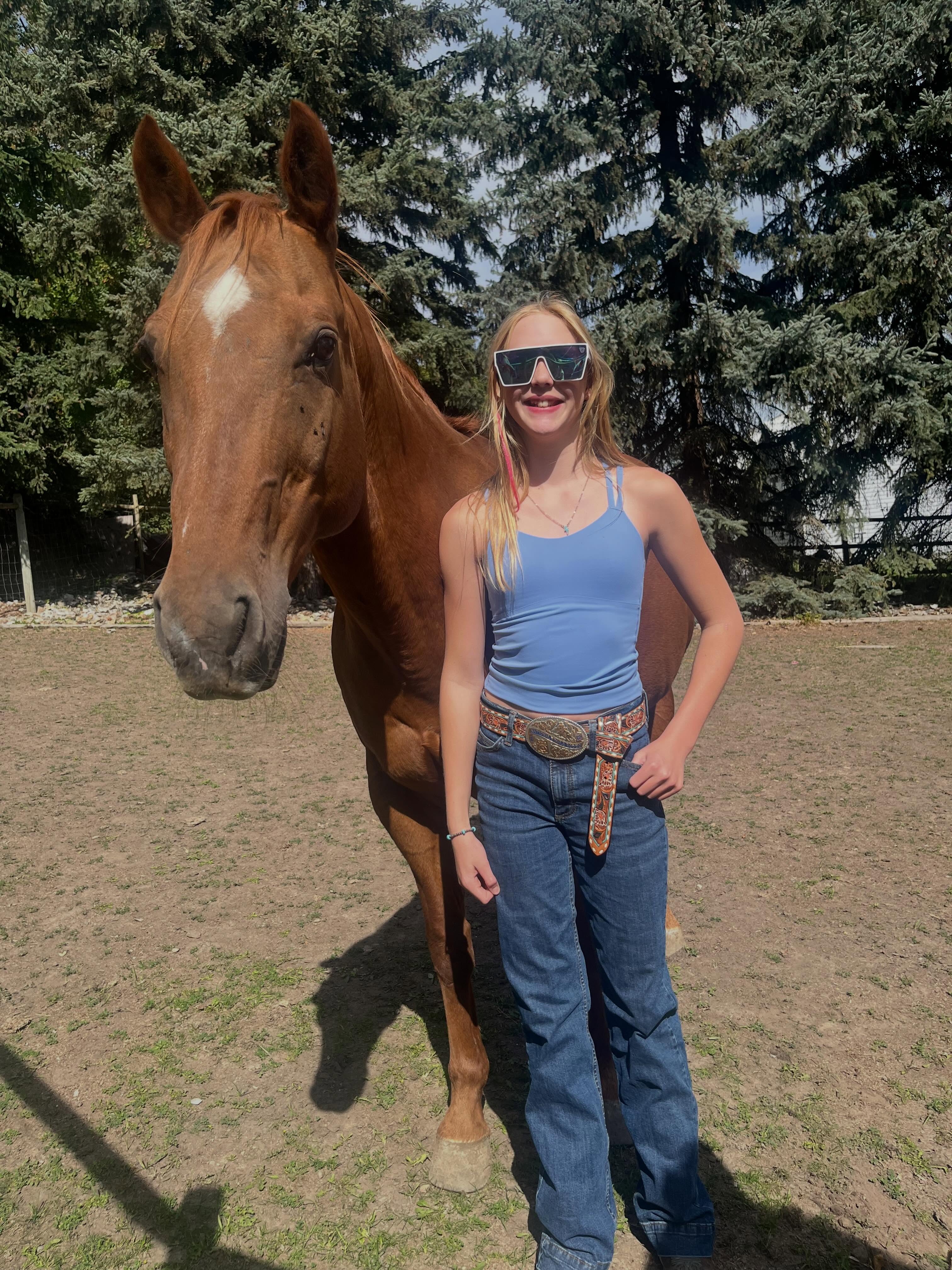 Grade 8 and Grade 5 this year! 
Yes, we just took these now. Yes, these 2 no longer think it’s cool to take first day photos with my cute heart chalkboard sign I made. So yes, when it was their idea to take a back to school picture with the horses I jumped at the opportunity! 🤣
Our beautiful young ladies 🥰