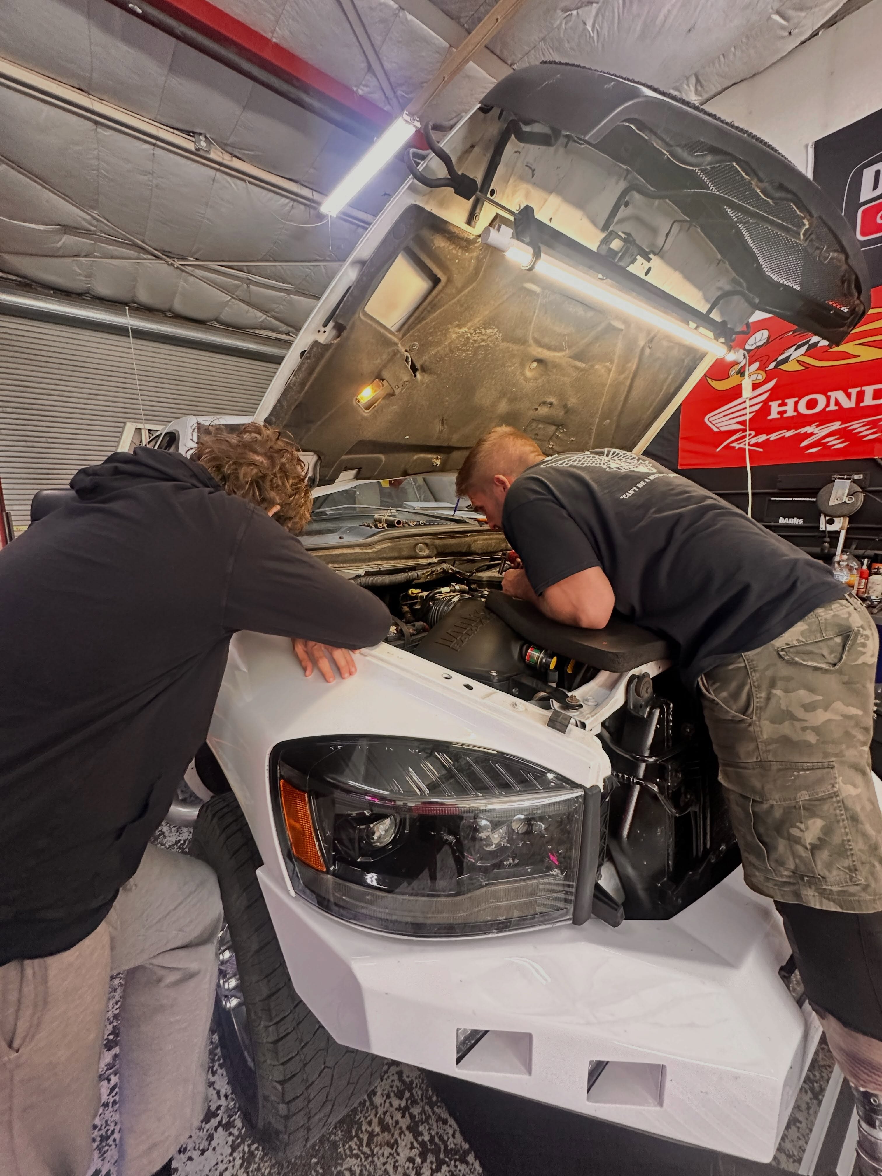 Two of my favorite people modifying the sled hauler. Who’s ready for winter? ❄️