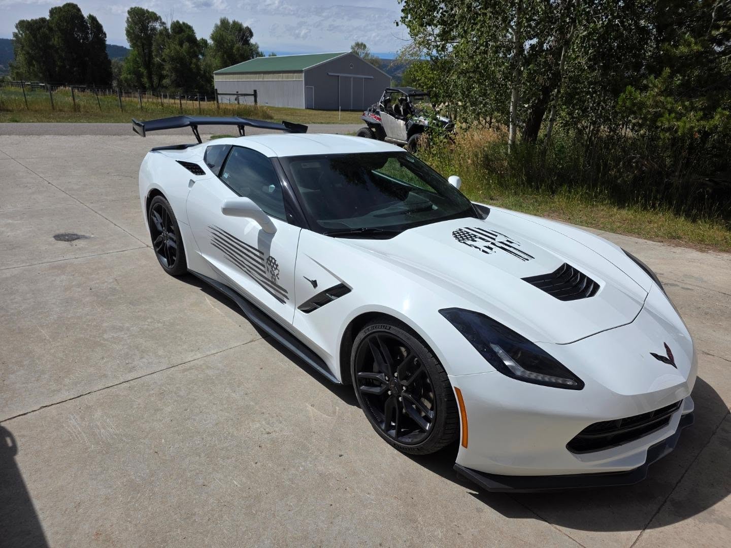 It didn't take long, but stormy got a face lift. Zr1 style spoiler, graphics of course and a new xpipe. Road trip soon.. 🤪

 Told the wife its not fair. She drives the car, 'hot chic in hot car' and all kinds of guys are all over her. Lol
Then I drive and  attract other guys looking at the car. 🤣  but can't blame the guys. 😍  All my car guys agree?