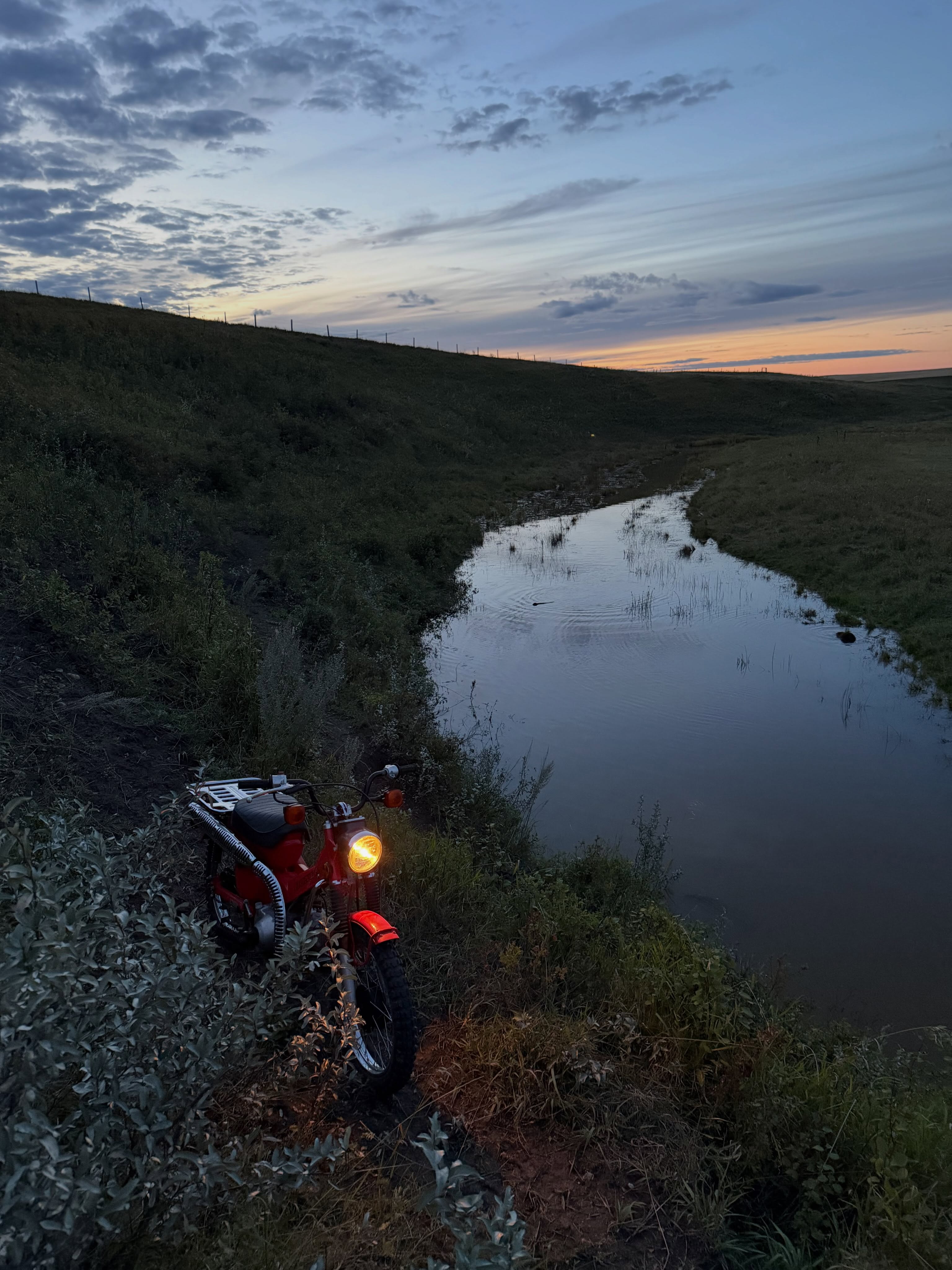 Nighttime adventures on the workhorse, thanks to @kstruks for doing the dishes while I monkey around. #honda #ct110 #sunset
