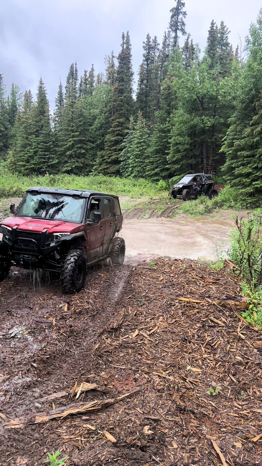 Polaris Xpedition and RZR Pro XP doing some creek crossing in high water. #alaska #polaris #turbo #mudding #boost 