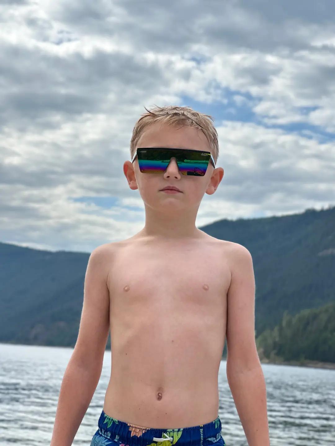 Kids rocking their Guns Out Glasses!  Sun, Sand, and Unstoppable Style." #Kids #Sunglasses  #GunsOutGlasses  #Summer #Beach www.GunsOutGlasses.com